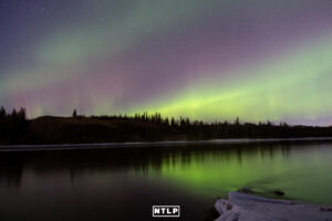 Northern Lights over the river